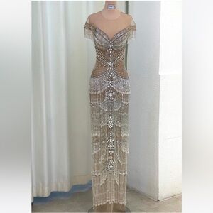 Custom-made dress size 12, roughly 38C . Worn once for my son's wedding.